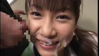 Her Cute Japanese Face Gets Coated in Thick Splooge at a Bukkake Shoot 9