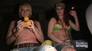Two Girls Dance and Flash in back Seat on the way out 11