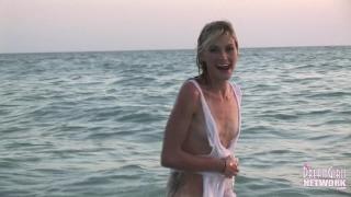 Wet T-shirt Model Rolls around in the Water at Sunset 10