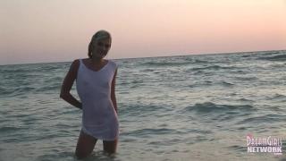 Wet T-shirt Model Rolls around in the Water at Sunset 5