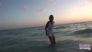 Wet T-shirt Model Rolls around in the Water at Sunset 6