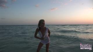 Wet T-shirt Model Rolls around in the Water at Sunset 7