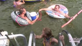 Hot Coed and MILF Play Naked on a Raft in Front of Huge Crowd 2