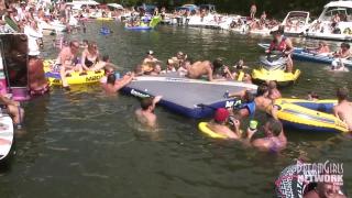 Hot Coed and MILF Play Naked on a Raft in Front of Huge Crowd 3