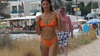 Busty Exhibitionist Ibiza Working Girl Eden does Topless Beach Walk 1