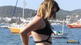 Busty Babe in Black Bikini to Topless Photo Shoot down on the Beach 3