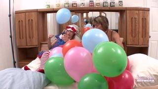 Costumed Looner Freaks Blow Balloons up & Pop them 6