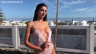 Young Tanned Brunette Goddess Topless using Rooftop Shower 6