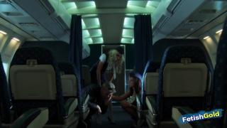 Two Busty Stewardesses have Naughty Lesbian Fun in the Airplane 1