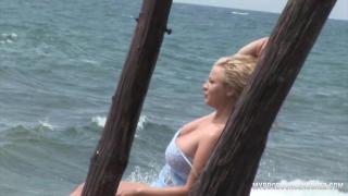 Busty Teen Malina get Wetting in Waves 5