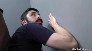 Bearded White Man Sucking and Fucking a Black Cock at a Gloryhole 12