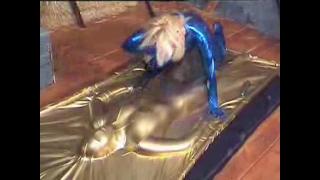 KERRI IN VAC BED FONDLED & TEASED BY BEV COCKS IN BLUE LYCRA 2