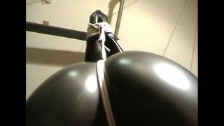 KERRI BOUND GAGGED & TETHERED TO CEILING IN ARMBINDER & PVC CATSUIT & VIBRATOR 10
