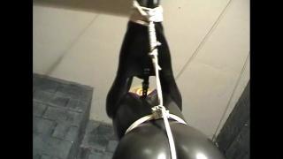 KERRI BOUND GAGGED & TETHERED TO CEILING IN ARMBINDER & PVC CATSUIT & VIBRATOR 8