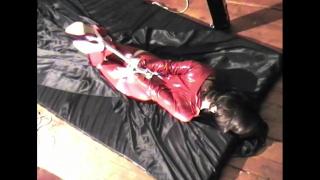 SARAH IN RED PVC CATSUIT & HIGH HEELED SHOES HOGTIED ON MATRESS & BALLGAGGED 9