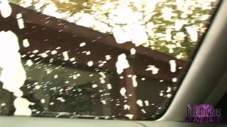 Dee uses her Big Tits to Wash her Car 8