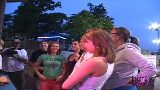 Group of Party Girls Flash Atop a Highway Billboard 10