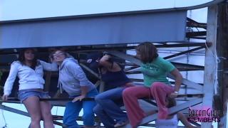 Group of Party Girls Flash Atop a Highway Billboard 4