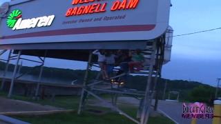 Group of Party Girls Flash Atop a Highway Billboard 6