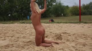 Famous Czech Pornstar Vinna Reed getting Naked and Showing Pussy in the Sand 11