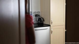 Brunette MILF Fucks herself with a Cucumber in the Kitchen when she Thinks she's alone 1