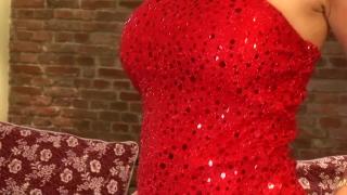 Woman in Red get Pleasure from a Cristal Dildo 2