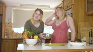 Busty Blonde BBW Bomba Deluxe and Hairy Chick Katie Fuck each other with Carrot in the Kitchen 1