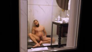 Mature Dude Filmed from outside while taking a Shower and Jerking off his Hard Cock 12