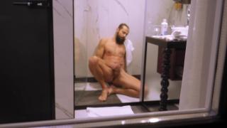 Mature Dude Filmed from outside while taking a Shower and Jerking off his Hard Cock 9
