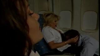 Busty Hot Stewardess Gets Licked and Fucked by the Captain while her Busty Cowerker Masturbating 2